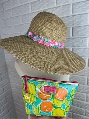 LILLY PULITZER WIDE BRIM STRAW GOLD HAT AND ESTEEE LAUDER COLAB ZIP
POUCH
